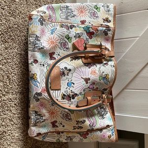 Disney print Dooney & Bourke tote.